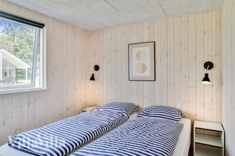 Ett av de 5 utmärkta sovrummen i lyxstuga nr 515 i Lolland/Falster/Møn.