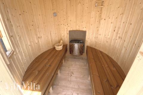 Njut av bastuvärmen i lyxstuga nr 515 för 14 personer