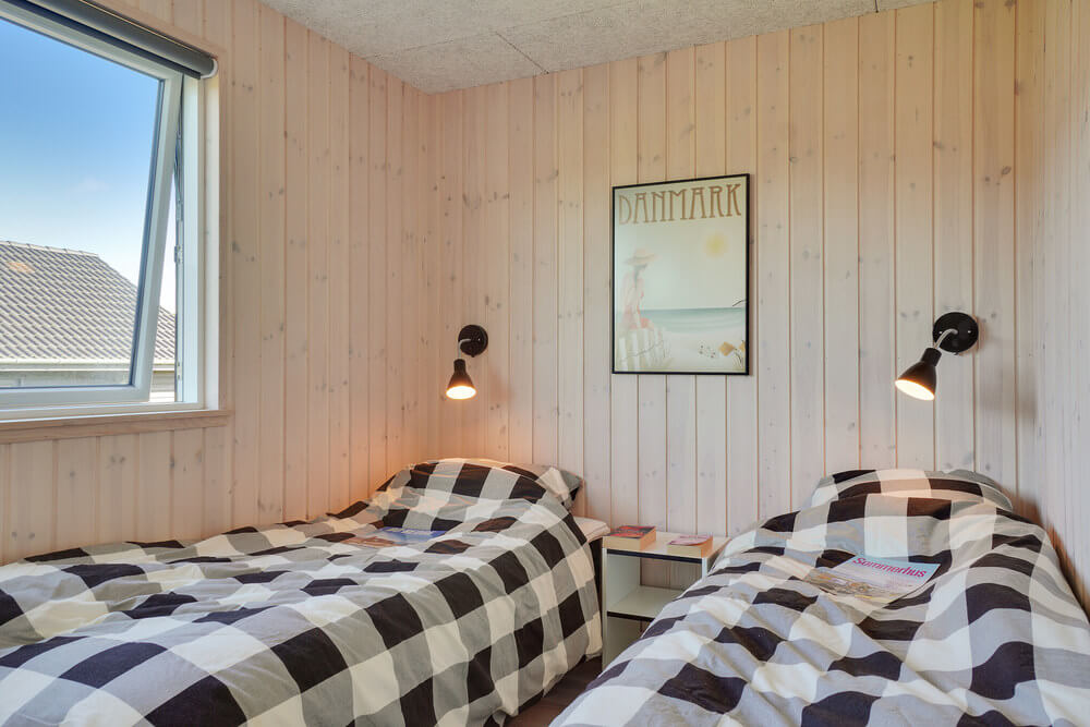 Ett av de 10 utmärkta sovrummen i lyxstuga nr 497 i Sydjylland.
