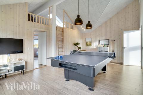 Lyxstuga 522 för 14 personer har ett stort aktivitetsrum med bl.a. biljard och dart