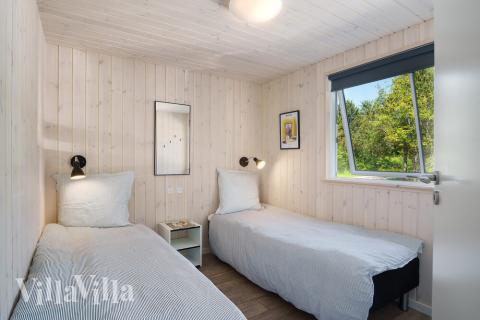 Ett av de 7 utmärkta sovrummen i lyxstuga nr 498 i Vestjylland.