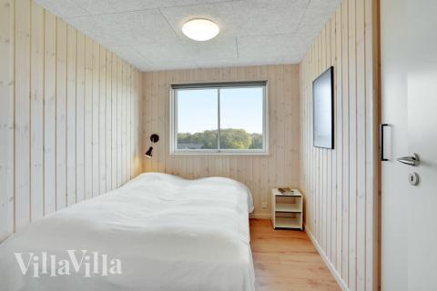 Ett av de 6 utmärkta sovrummen i lyxstuga nr 521 i Sydjylland.