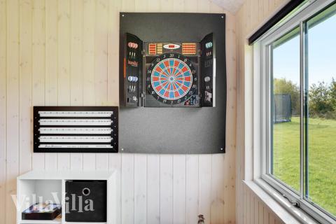 Tävla i sommarhusets aktivitetsrum när ni besöker lyxhus nr 521 i Sydjylland.