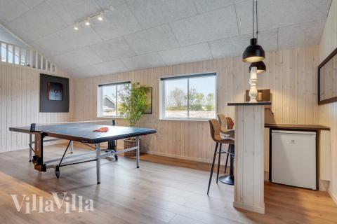 Tävla i sommarhusets aktivitetsrum när ni besöker lyxhus nr 508 i Sydjylland.