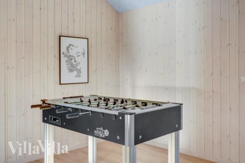 Aktivitetsrum i lyxstuga nr 499 med 9 sovrum och plats för 24 personer.