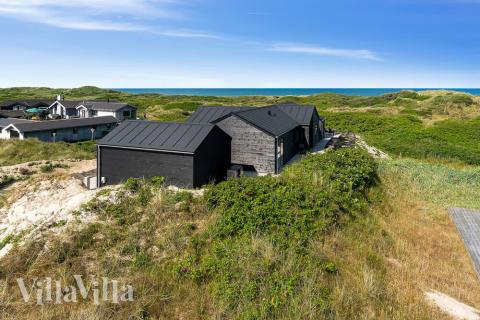 Njut av bubbelpoolen i lyxstuga nr 514 i Nordjylland.