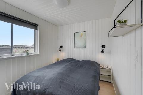 Ett av de 9 utmärkta sovrummen i lyxstuga nr 516 i Vestjylland.