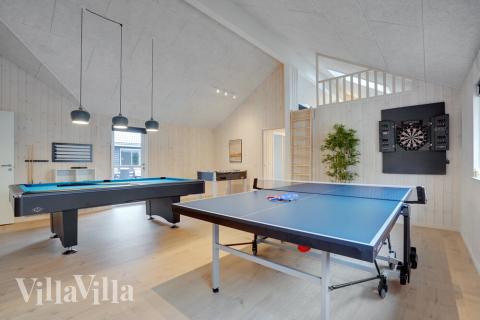 Aktivitetsrum i lyxstuga nr 526 med 8 sovrum och plats för 20 personer.