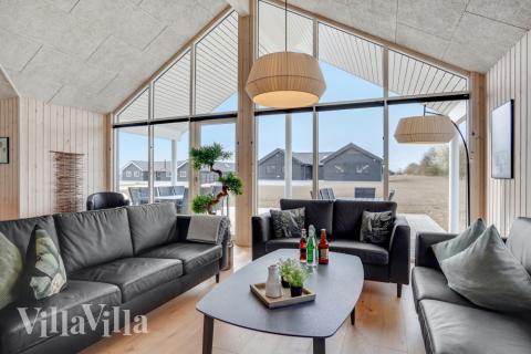 När ni besöker lyxhus nr 488 kan ni mysa tillsammans i sofforna.