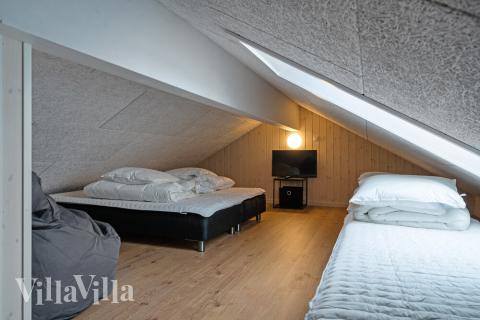 Några av de 18 sovplatserna finns på loftet i lyxstuga nr 520