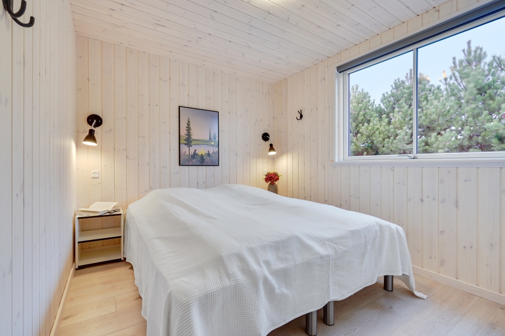 Ett av de 8 utmärkta sovrummen i lyxstuga nr 532 i Lolland/Falster/Møn.