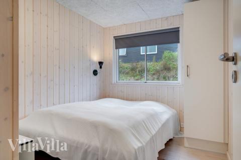 Ett av de 10 utmärkta sovrummen i lyxstuga nr 530 i Sydjylland.