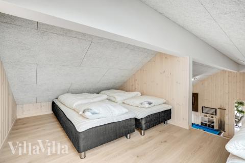 Några av de 16 sovplatserna finns på loftet i lyxstuga nr 527