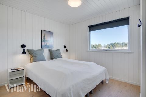 Ett av de 5 utmärkta sovrummen i lyxstuga nr 533 i Vestjylland.