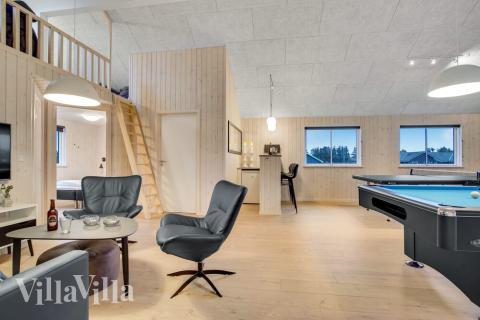 Tävla i sommarhusets aktivitetsrum när ni besöker lyxhus nr 529 i Nordjylland.