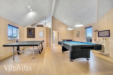 Lyxstuga 529 för 20 personer har ett stort aktivitetsrum med bl.a. biljard och dart