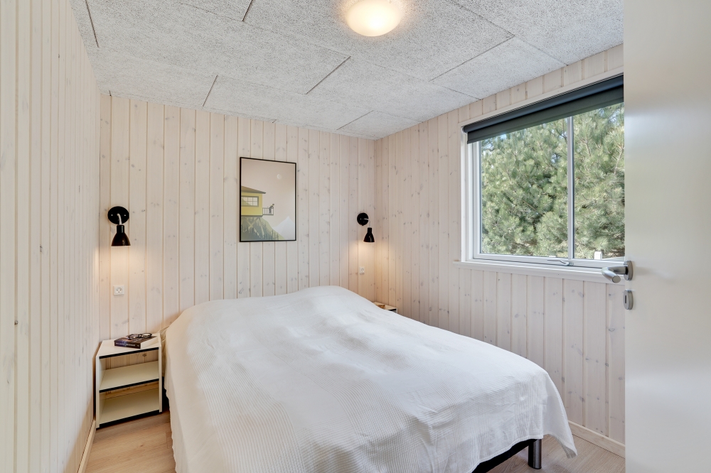 Ett av de 6 utmärkta sovrummen i lyxstuga nr 525 i Lolland/Falster/Møn.