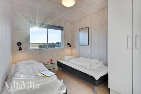Ett av de 7 utmärkta sovrummen i lyxstuga nr 536 i Vestjylland.
