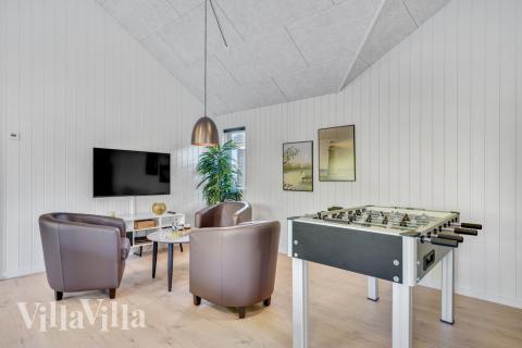 Tävla i sommarhusets aktivitetsrum när ni besöker lyxhus nr 536 i Vestjylland.