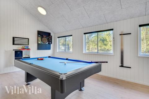 Aktivitetsrum i lyxstuga nr 536 med 7 sovrum och plats för 18 personer.