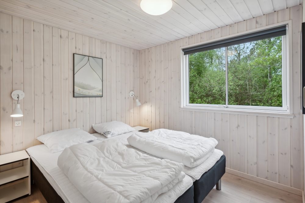 Ett av de 8 utmärkta sovrummen i lyxstuga nr 535 i Vestjylland.
