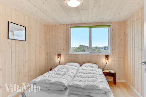 Ett av de 4 utmärkta sovrummen i lyxstuga nr 539 i Limfjorden.