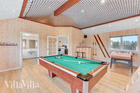 Aktivitetsrum i lyxstuga nr 539 med 4 sovrum och plats för 14 personer.