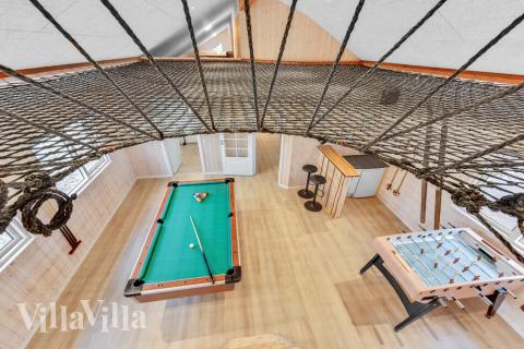 Tävla i sommarhusets aktivitetsrum när ni besöker lyxhus nr 539 i Limfjorden.