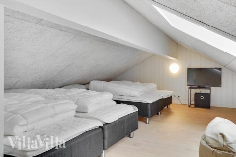 Några av de 18 sovplatserna finns på loftet i lyxstuga nr 541