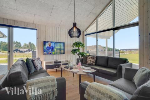 Soffhörnan i lyxstuga 542 i Limfjorden.