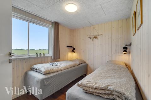 Ett av de 10 utmärkta sovrummen i lyxstuga nr 546 i Limfjorden.