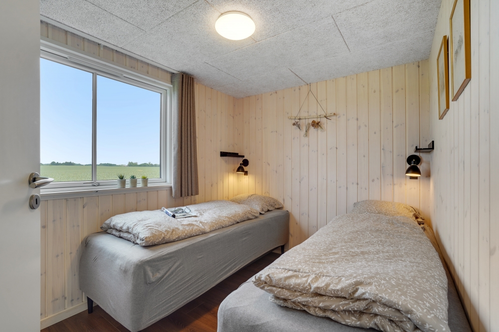 Ett av de 10 utmärkta sovrummen i lyxstuga nr 546 i Limfjorden.