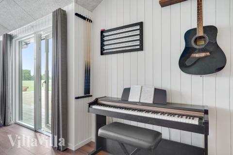 Aktivitetsrum i lyxstuga nr 546 med 10 sovrum och plats för 30 personer.