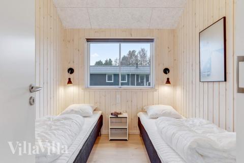 Ett av de 6 utmärkta sovrummen i lyxstuga nr 543 i Lolland/Falster/Møn.