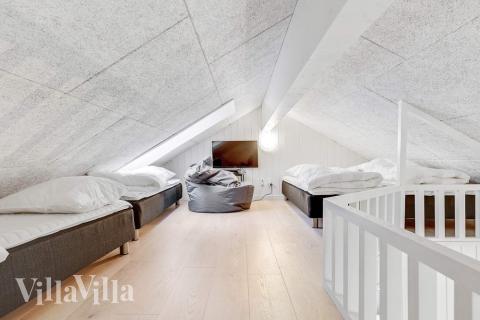 Några av de 16 sovplatserna finns på loftet i lyxstuga nr 543