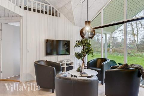 Aktivitetsrum i lyxstuga nr 543 med 6 sovrum och plats för 16 personer.