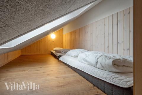 Några av de 14 sovplatserna finns på loftet i lyxstuga nr 544