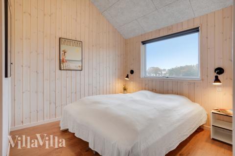 Ett av de 5 utmärkta sovrummen i lyxstuga nr 544 i Østjylland.