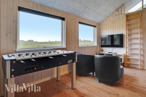 Aktivitetsrum i lyxstuga nr 544 med 5 sovrum och plats för 14 personer.