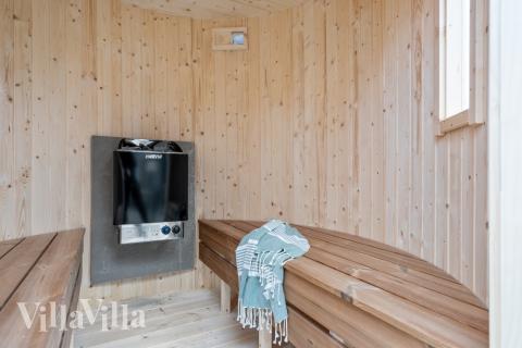 Njut av bastuvärmen i lyxstuga nr 549 för 14 personer