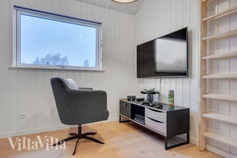 Aktivitetsrum i lyxstuga nr 549 med 5 sovrum och plats för 14 personer.