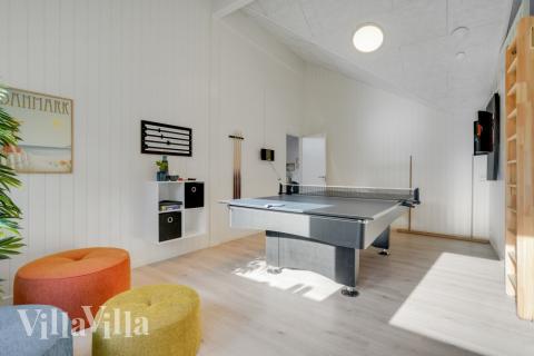 Aktivitetsrum i lyxstuga nr 540 med 5 sovrum och plats för 14 personer.