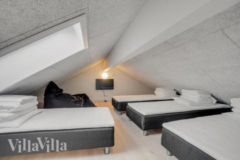 Några av de 14 sovplatserna finns på loftet i lyxstuga nr 540