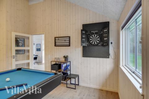 Aktivitetsrum i lyxstuga nr 568 med 6 sovrum och plats för 16 personer.