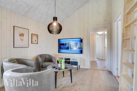 Soffhörnan i lyxstuga 547 i Limfjorden.