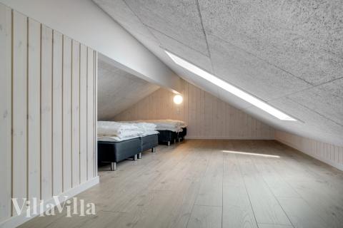 Några av de 18 sovplatserna finns på loftet i lyxstuga nr 547