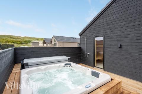 Ta ett dopp i poolen i lyxhus nr 558 i Vestjylland.