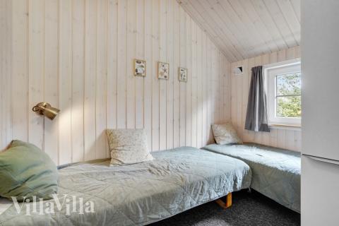 Ett av de 6 utmärkta sovrummen i lyxstuga nr 570 i Vestjylland.