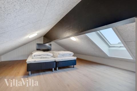 Några av de 24 sovplatserna finns på loftet i lyxstuga nr 551