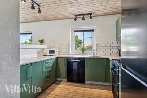 Köket i lyxstuga nr 572 är utrustat så att ni kan laga mat till 12 personer.